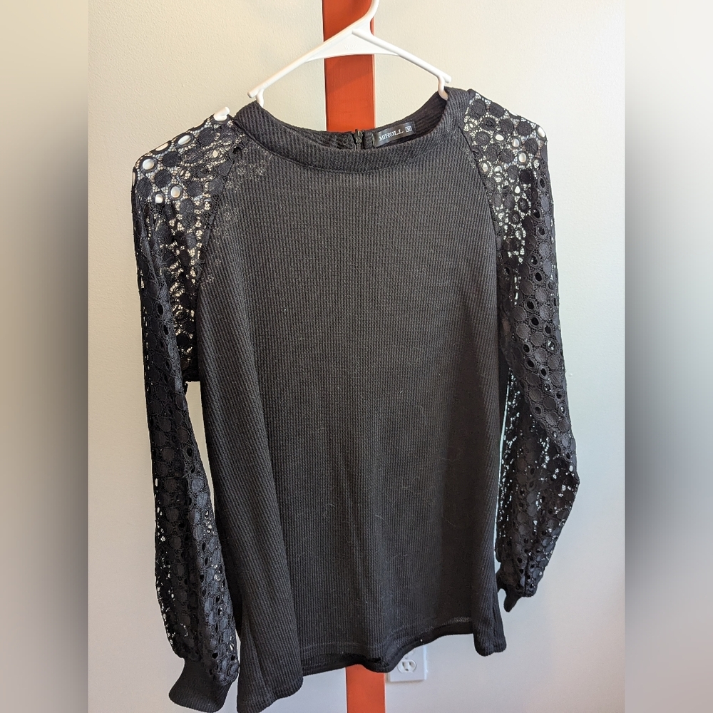 Black woman's top.